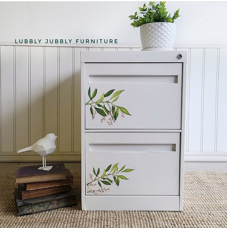 White painted filing cabinet with green leaf decals