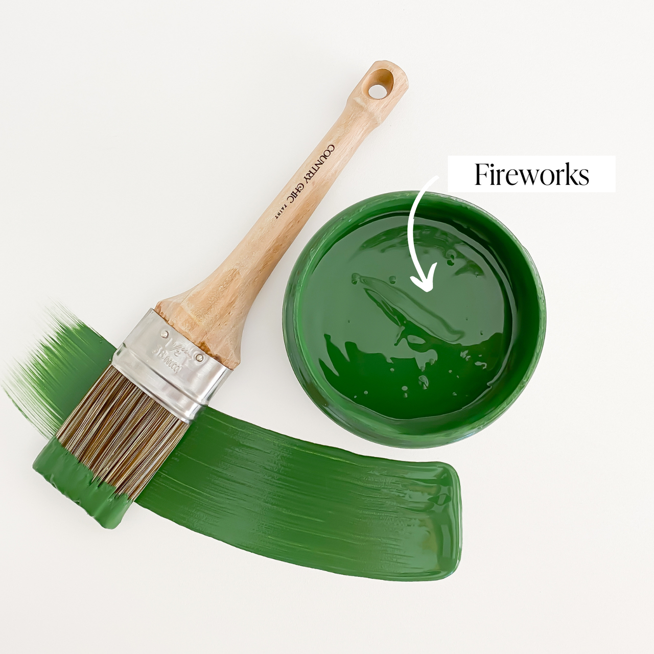Top view of an open 16oz jar of Country Chic Chalk Style All-In-One Paint in the color Fireworks. Emerald green.